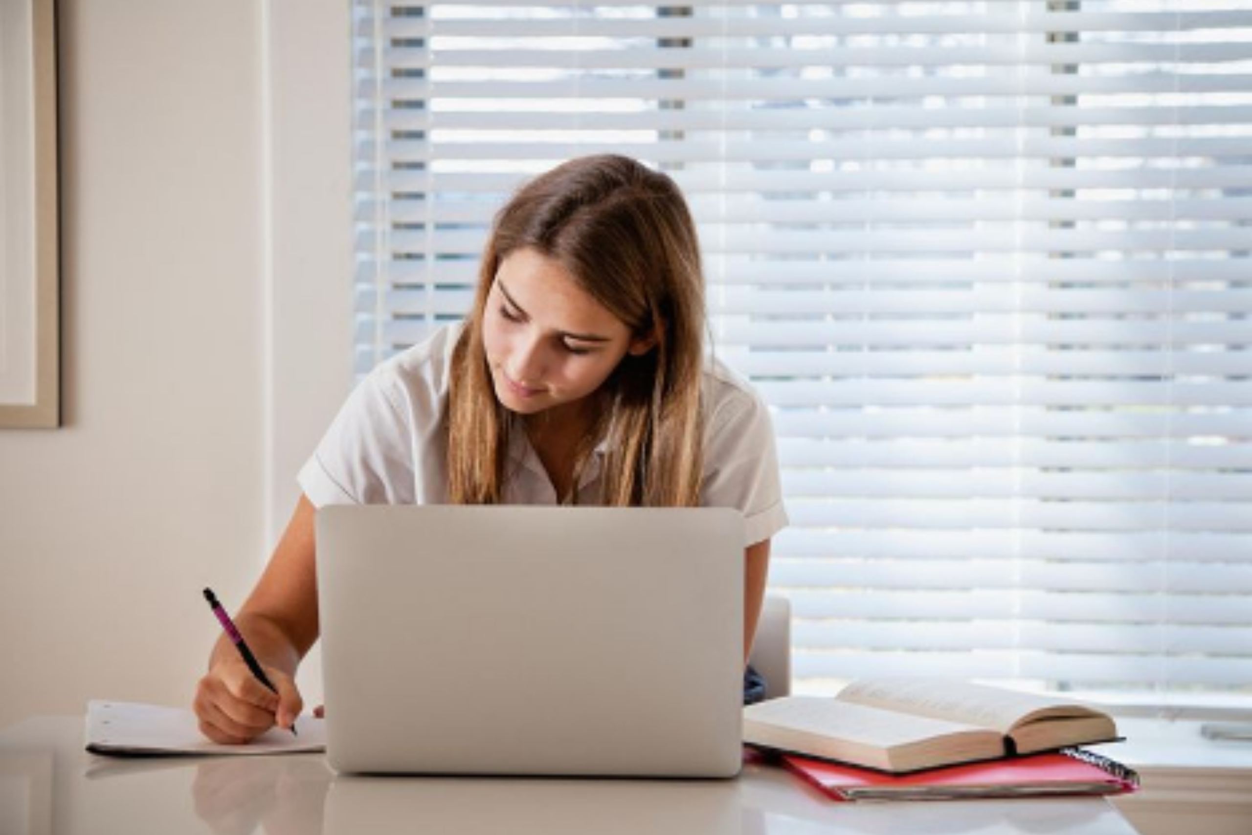 Student completing schoolwork at home